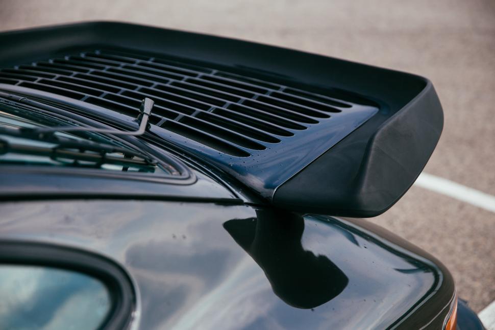 side-view-of-a-black-sports-car-spoiler